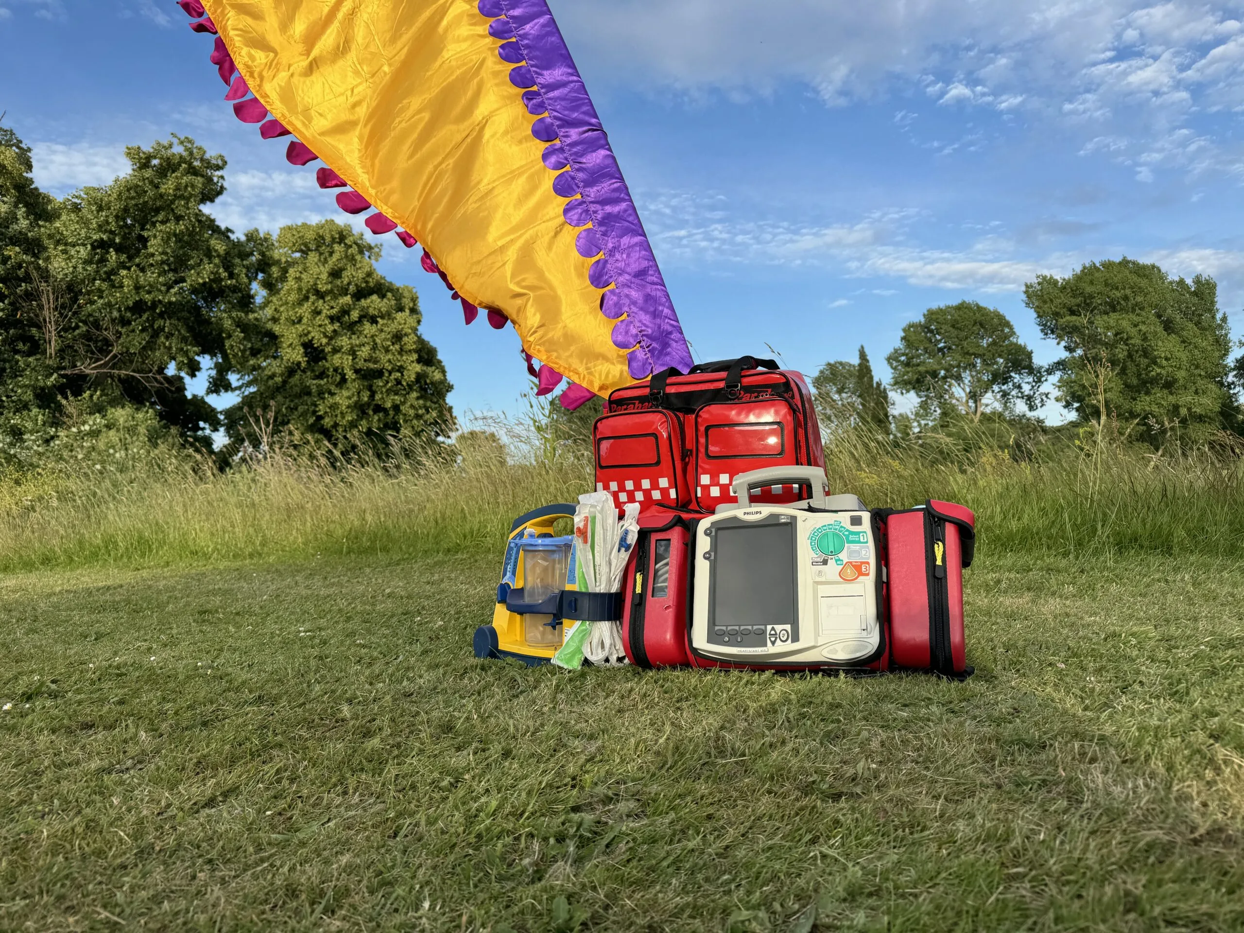 Event medical equipment and AED positioned for rapid access.